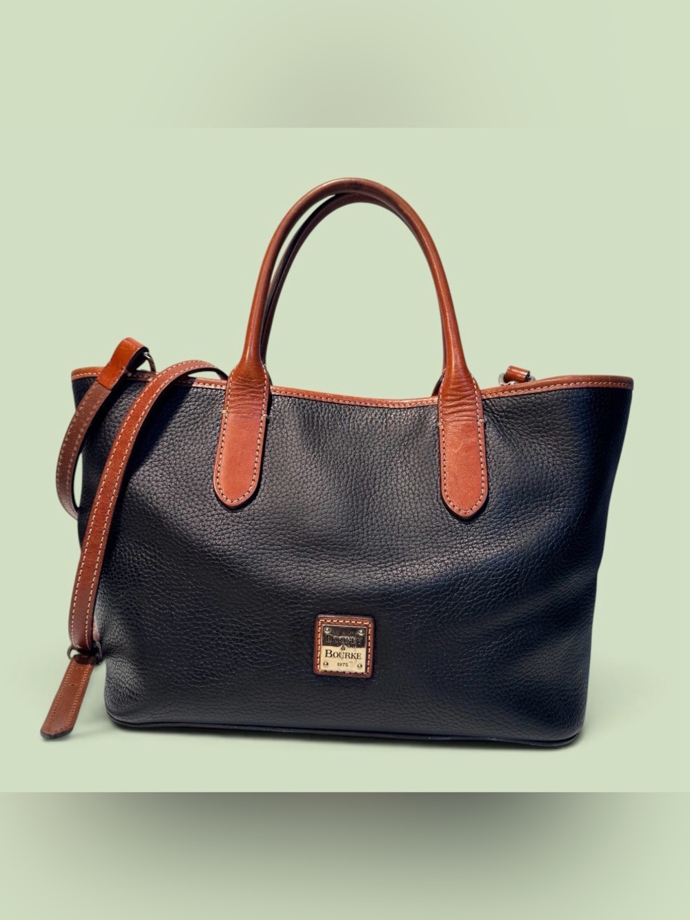 Dooney & Bourke Black Pebbled Leather Tote with Brown Trim & Handles